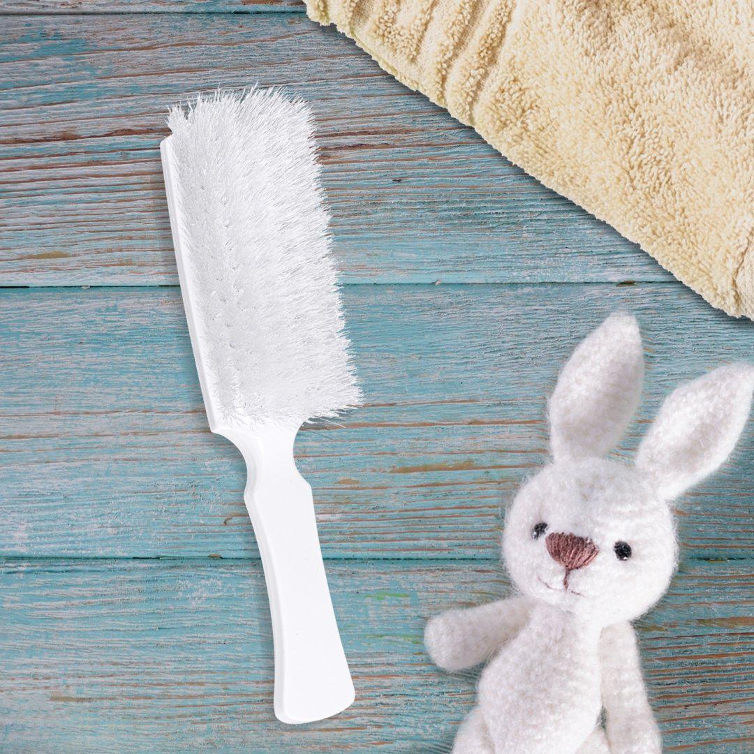 Cleaning brushes with soft and hard bristles